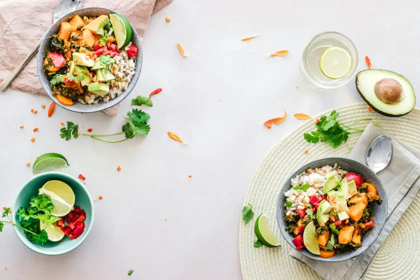 Weeknight meal on a table with vegetables and bowls